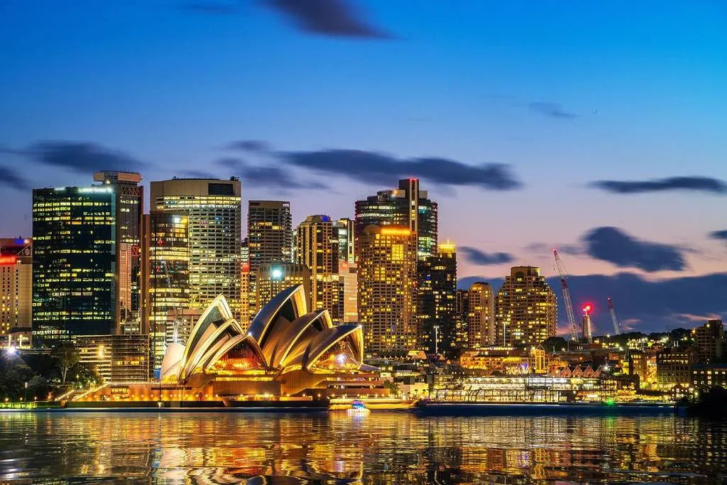Sydney city skyline and Opera House at dusk